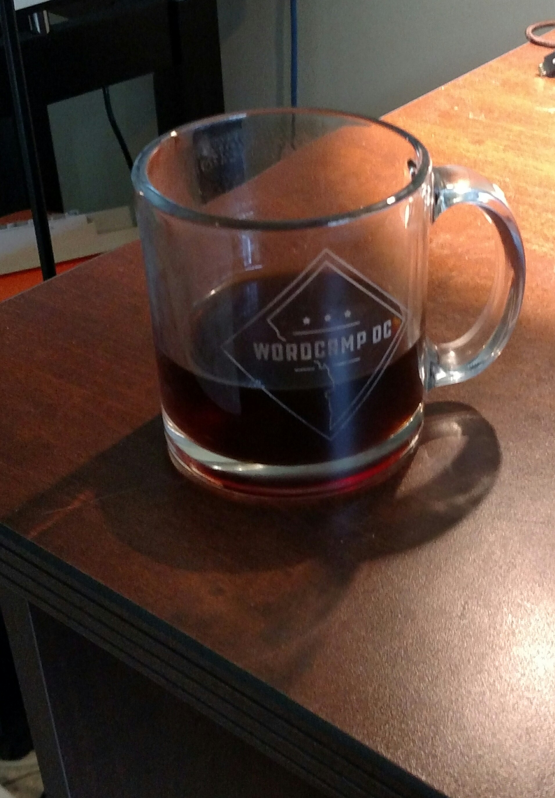 WordCamp DC Mug half-filled with Coffee